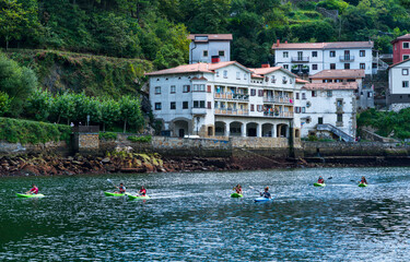 Kayaking, Pasaia San Juan or Pasai Donibane town, Jaizkibel Mountain range, Gipuzkoa province,...