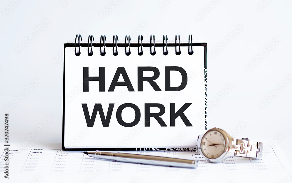Poster word writing text hard work on notepad. business concept with clock,pen and chart