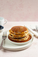 stack of pancakes with syrup