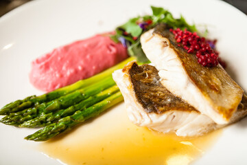 Pike-perch fillet. Asparagus, pearl couscous, white wine sauce, beet-flavored mashed potatoes....