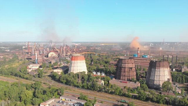 Steel plant smoke manufacturing aerial drone forward push in camera movement Krivoy Rog Ukraine