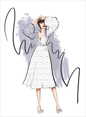 woman in dots dress with puffy sleeves