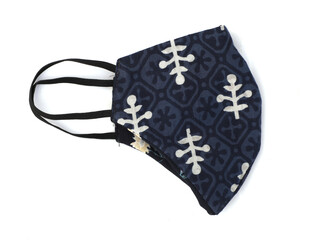 Homemade protective mask and pieces of cloth	
