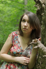 Naklejka premium Scared young woman a forest at night.