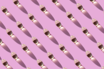 Creative layout of pills and capsules on pink background with summer sun and sharp shadow. Covid-19...