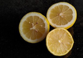 Delicious halved Sicilian lemon on the table.