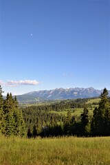 Tatra Mountains panorama. Gorgeous mountain range with high rocky peaks. Beautiful view from Kotelnica mountain. Bialka Tatrzanska, Podhale, Poland. High Tatra summits.