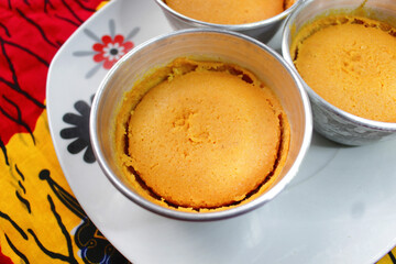 Close up view of a crispy cup of yummy Beans Cake or Nigerian Moi Moi 