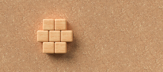 empty wooden cubes in the shape of a hexagon for own messages and icons on cork background