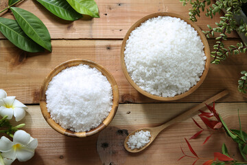 Sea salt in wooden bowl and spoon 
