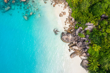 Beautiful island in the seychelles. La digue, anse d'argent beach. Water flowing, and waves foam on...