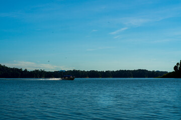 Kenyir, Malaysia - July 23, 2020: Speed boat moving fast.