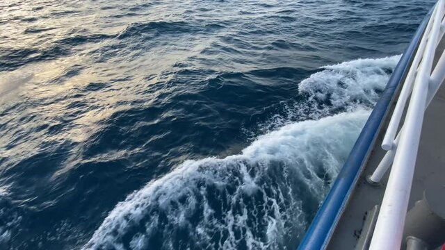Water waves. Ship's bow, moving through the waves. View from the side deck.