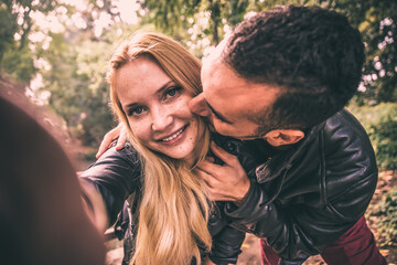 Fototapeta premium Young couple love moments in the park