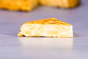 Tempting slice of fresh delicious spanish omelet