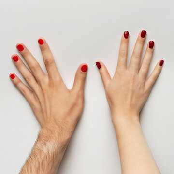 female and male manicure. hands close up