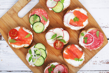 Top view on different sandwiches, flat lay
