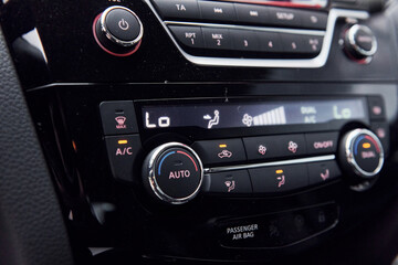 Radio panel. Modern new luxury automobile interior. Design and technology