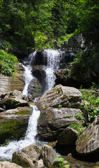 Fototapeta na wymiar Beautiful landscape of a mountain waterfall