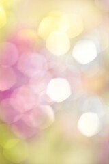 Soft blurred background of pink and yellow colors. Bokeh with highlights.
