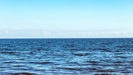 blue sea landscape with sky on the horizon
