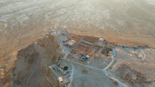 Aerial view of the ruins of Massada is a fortress built by Herod the Great on a cliff-top off the coast of the Dead Sea. Destroyed by the Romans in the 1st century AD e. Included in the UNESCO World H