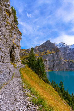.Swiss Alps, Kandersteg, Lake Oeschinensee, Bernese Oberland, Europe. A scenic depiction of a popular tourist attraction. Discover the beauty of the earth.