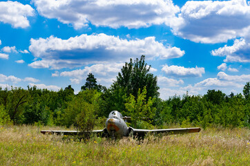 plane- 8 August 2020: Old aircraft Antonov An-2 at abandoned Airbase aircraft cemetery in Vovchansk, Kharkov region, Ukraine.