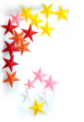 Colorful origami paper stars on white background