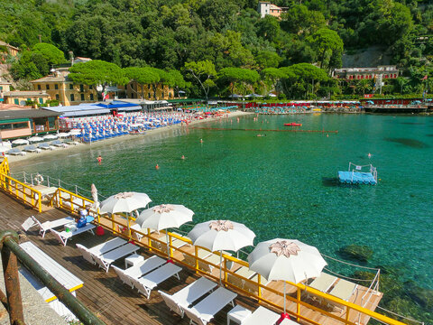 Portofino, Italy - September 16, 2019: beach known as paraggi near portofino in genoa on a blue sky and sea background