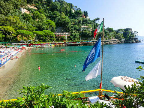 Portofino, Italy - September 16, 2019: beach known as paraggi near portofino in genoa on a blue sky and sea background