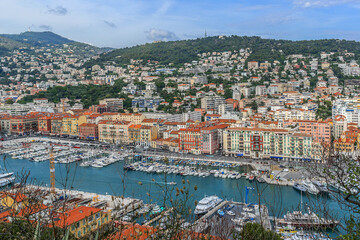 Fototapeta na wymiar Wonderful panoramic view of Nice with colorful historical houses. Nice - luxury resort of Cote d'Azur, France.