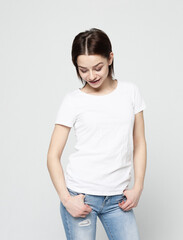 Obraz premium young female dressed in casual clothes, over white background.