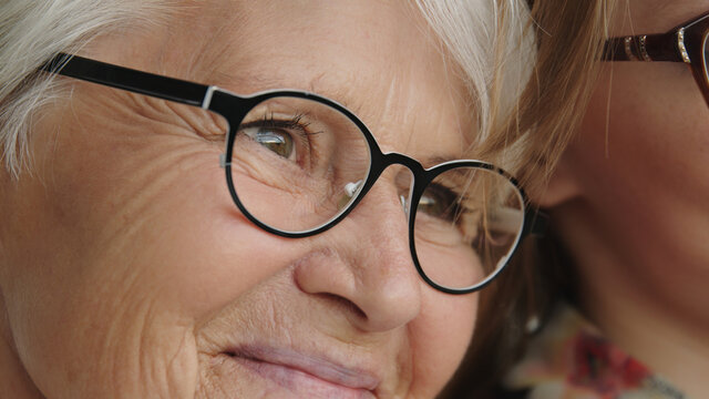 Emotional bounding of young and senior woman. Mother and daughter. Close up. High quality photo