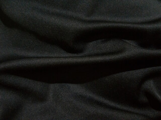 Obraz na płótnie Canvas Black and white wave cloth is a beautiful wrinkle texture. luxurious background design