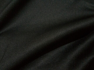 Obraz na płótnie Canvas Black and white wave cloth is a beautiful wrinkle texture. luxurious background design