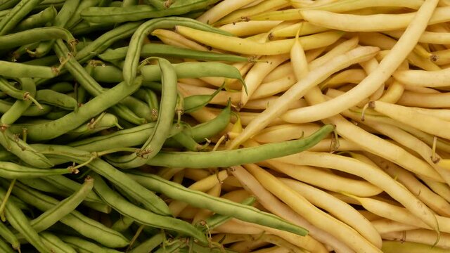 Green and yellow beans. Ripe asparagus top view.
