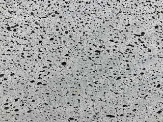 a stone pattern background with irregular holes