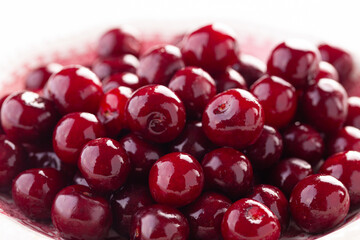 ripe cherry in close-up on white background.