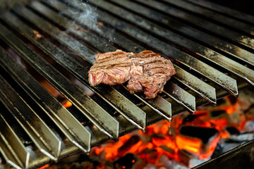 Grilling meat. Grill, meat and fire