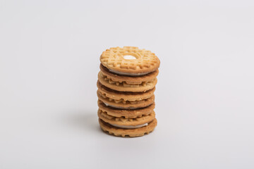 Cream sandwich biscuits on white background