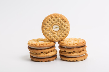 Cream sandwich biscuits on white background