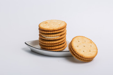 Cream sandwich biscuits on white background