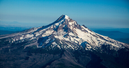 A summer aerial shot of Mt Hood with much of its snow melted