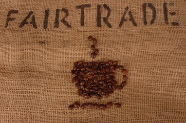 coffee beans on burlap background