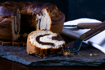 Delicious homemade marble pound cake on a stone board