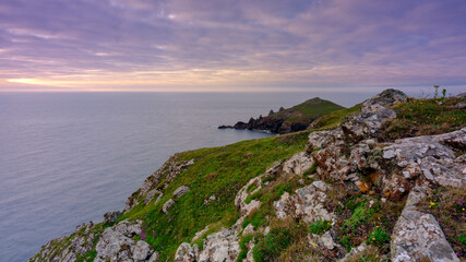 Naklejka premium Summer sunset over The Rumps and Pentire Head on the North Coast of Cornwall, UK
