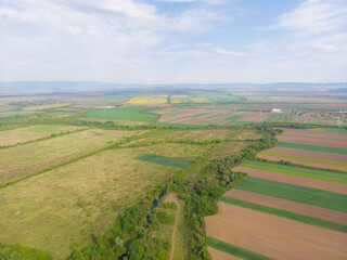 Fototapeta na wymiar Arable land and nature in the plains of Vojvodina. Aerial photography.
