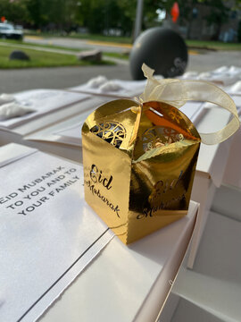 Eid Adha Mubarak for Muslim community around the world.
Happy energetic photo of Eid gifts and goody bags for Muslims in front of the Masjid.
