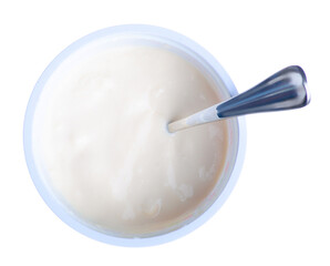 fermented baked milk yogurt with spoon on white background isolation, top view